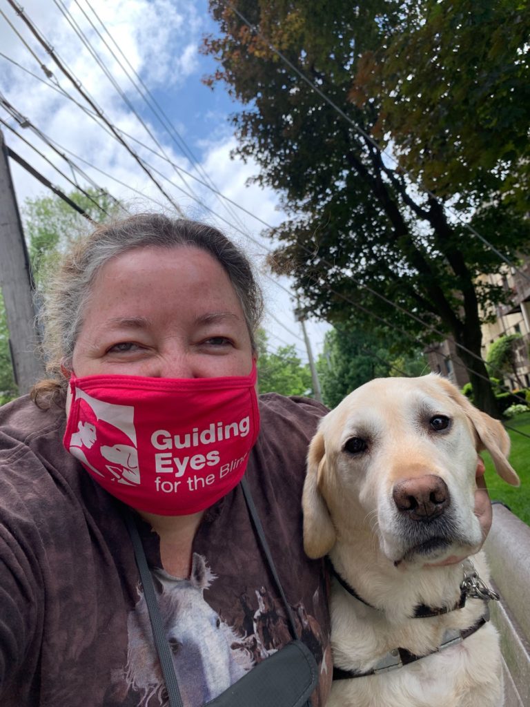 Annie with pink mask and Bailey close up